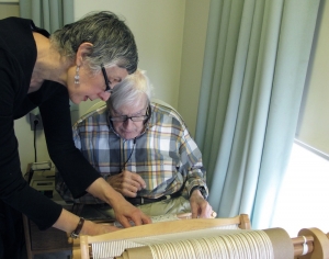 Catherine Tutter assisting Sergio Bru with weaving
